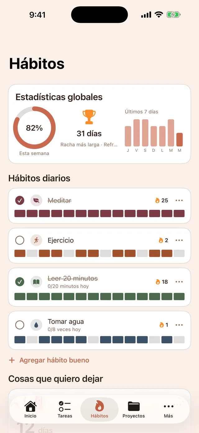 Pantalla de Hábitos de Doodue en iPhone con estadísticas, rachas e historial.